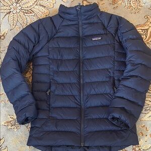 Patagonia kids blue down coat.